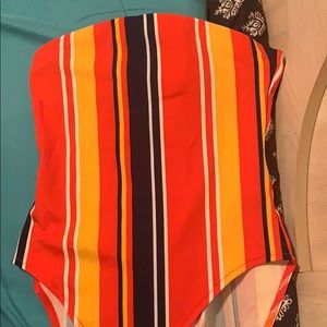 Red/multi color body suit never worn